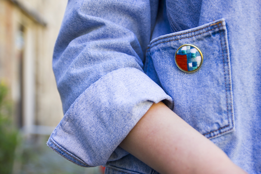 Lauren Smith embroidered Orange & Blue Patchwork Pin worn on denim jacket