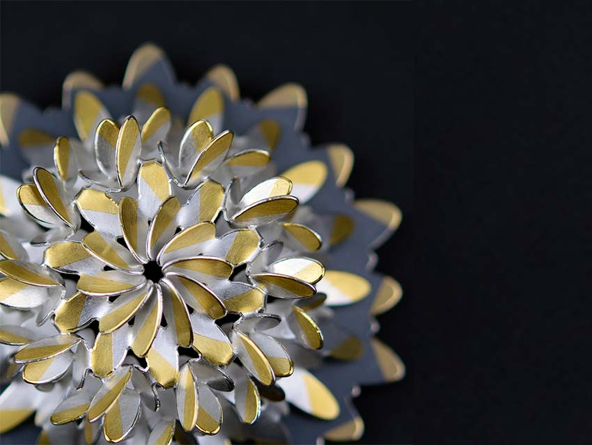 Details of the Circular Oval Flower Brooch by Misun Won on black background