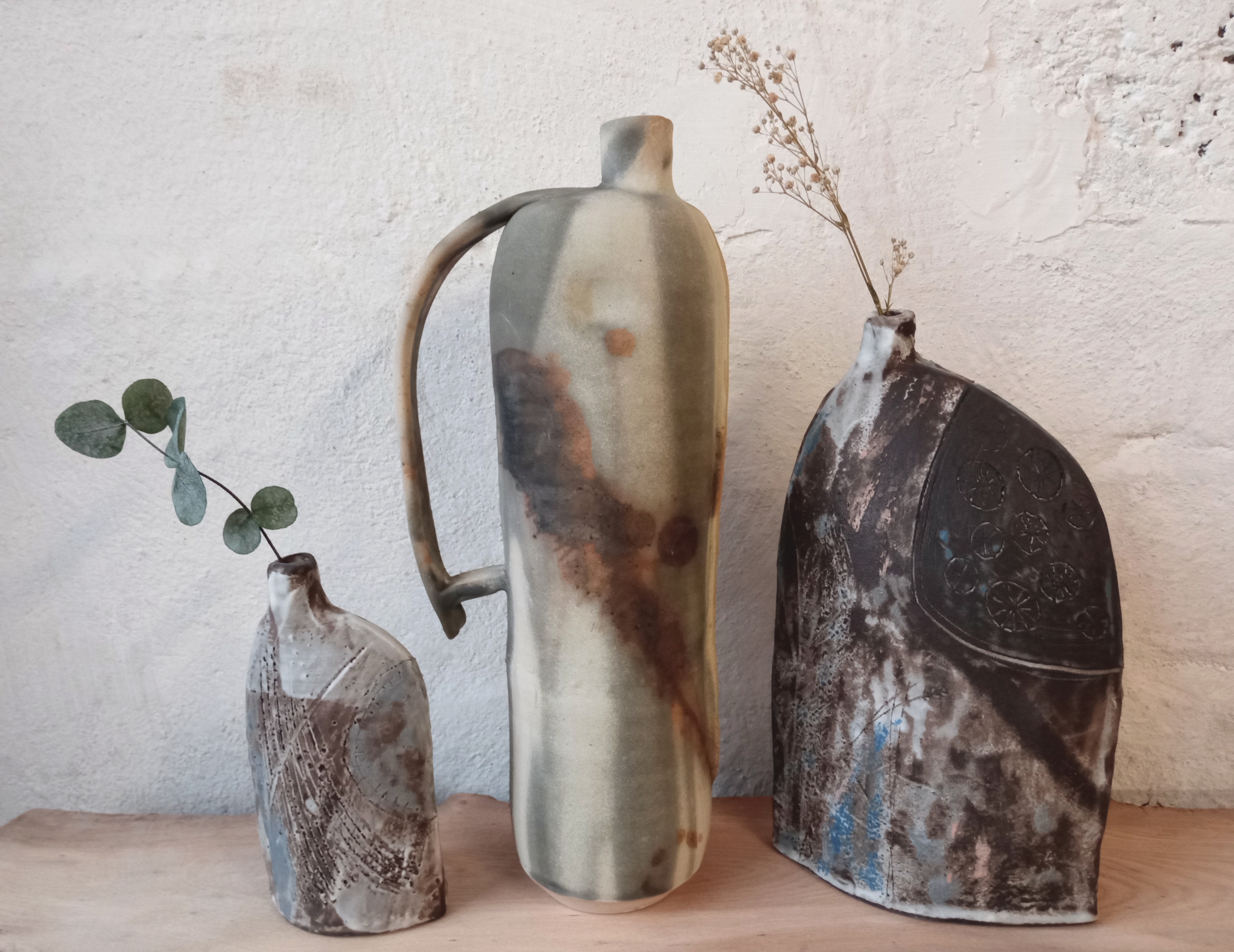 Texture and ash glazed bottles