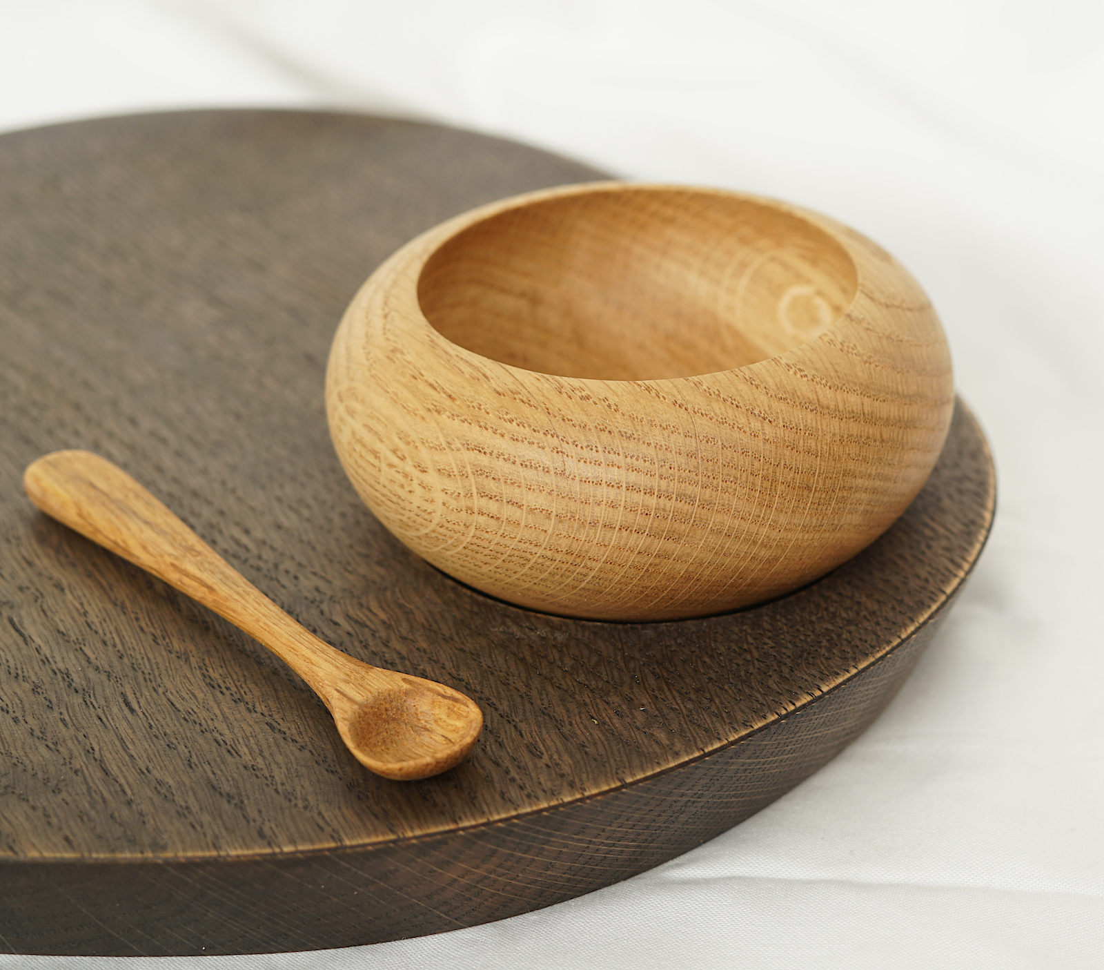 oak bowl, spoon, ebonised board